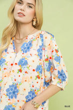 Umgee mixed floral print blouse in soft cream with vibrant blue orange and green floral print for womens wear