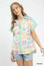 Umgee mixed media short-sleeved button-up shirt with pastel geometric print on white background