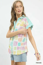 Pastel-colored geometric print short-sleeved blouse with ruffled sleeves and collared neckline umgee mixed media top