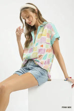 Pastel-colored umgee mixed media print short-sleeve blouse with collar and ruffled sleeves in geometric design