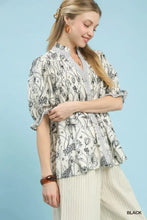 Black and white floral print mixed print button front top with puffed sleeves and peplum hem by Umgee