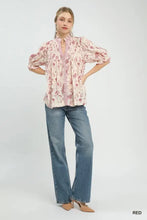 Umgee mixed print button front top with pink and white floral print, puffed sleeves, and ruffled cuffs
