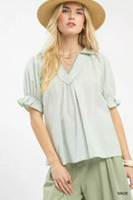 Umgee pinstripe v-neck ruffle sleeve blouse in light green and white with a relaxed fit and vertical stripes