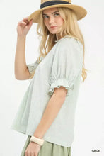 Light green and white umgee pinstripe v-neck ruffle sleeve blouse with short ruffle sleeves in lightweight fabric