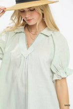 Umgee pinstripe ruffle sleeve blouse in sage green and white with v-neckline lace trim and puffed short sleeves