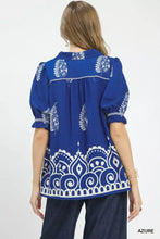 Azure blue umgee printed puff sleeve split neck top with white paisley mandala patterns puffed sleeves and ruffled hem