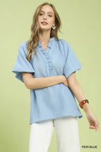 Peri blue textured short-sleeved ruffle neck tunic blouse with button detail by umgee