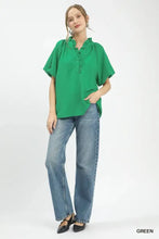 Vibrant green umgee ruffle neck tunic blouse with puff sleeves and subtle texture in lightweight fabric