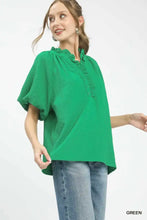 Vibrant green textured umgee puff sleeve blouse with ruffle neck tunic and button detail