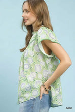 Light green retro floral smocked babydoll blouse with ruffled sleeves and a high neckline by Umgee Retro Floral