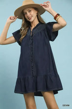 Navy blue umgee ruffled washed denim dress with short flutter sleeves and ruffled hem in a casual style