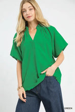 Vibrant green scalloped hem textured blouse with v-neck and gathered neckline by Umgee in short sleeves