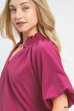 Berry-colored umgee scalloped hem textured blouse with ruffled neckline and short puffed sleeves