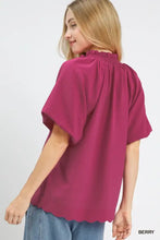 Umgee berry-colored blouse with ruffled neckline and scalloped hem textured detail for elegant wear