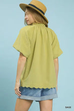 Umgee scalloped hem textured blouse in sage color with short sleeves and ruffled neckline for stylish wear