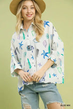 Umgee seashell and starfish print button-down top with white fabric and playful blue green purple starfish print