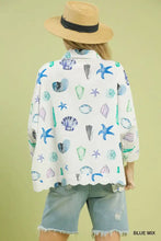 White Umgee button-down blouse with playful sea-themed starfish print in blue green and purple tones