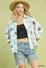 Umgee seashell and starfish print button-down top in white with playful blue green and purple starfish print design