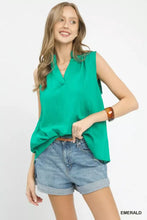 Emerald umgee sleeveless textured notch neck blouse with soft flowing fabric and v-neckline for elegant wear
