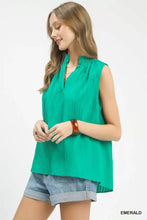 Emerald sleeveless textured notch neck blouse by Umgee with ruched neckline and soft flowing fabric