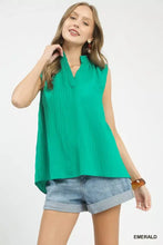 Umgee sleeveless textured notch neck top in emerald green with soft flowing fabric and v-neckline for elegant wear