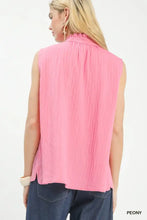 Umgee sleeveless textured gauze top in soft pink with a ruffled high split neck and vertical pleats in textured gauze fabric