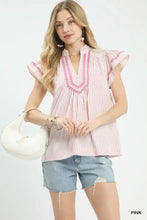 Umgee striped flutter sleeve top with pink and white vertical stripes and pink embroidered v-neck detailing