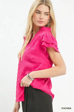 Fuchsia umgee textured flutter sleeve split neck top with ruffled short sleeves and high neckline in textured fabric