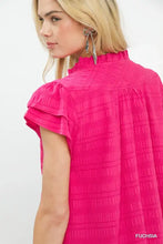 Umgee textured flutter sleeve split neck top in fuchsia with ruffled short sleeves and high neckline