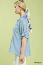 Misty blue umgee textured henley blouse featuring ruffle cuffs and a patterned collar in soft fabric