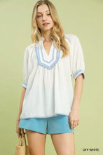 Off-white umgee textured jacquard blouse with light blue jacquard contrast trim and embroidered detailing