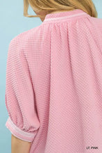 Light pink textured jacquard blouse with subtle jacquard contrast trim at collar and cuffs by umgee
