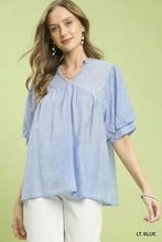 Umgee light blue textured blouse with puffed sleeves v-neckline and delicate textured lace trim detailing