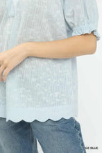 Ice blue sheer umgee textured pintuck blouse with delicate floral embroidery and scalloped hem for elegant wear