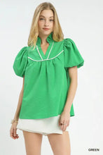 Umgee textured puff sleeve blouse in green with textured puff fabric and white piping along the neckline