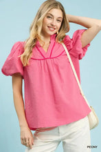 Pink textured puff sleeve blouse umgee textured puff sleeve blouse features ruffled short sleeves and v-neckline trim