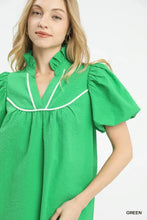 Vibrant green umgee textured puff sleeve blouse with ruffled collar and white piping accents