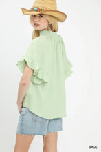 Light green Umgee textured ruffle sleeve blouse with short sleeves and a high neckline for stylish wear