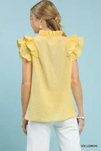 Yellow umgee textured ruffle sleeve blouse with high neckline and ruffled short sleeves in textured fabric
