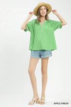 Apple green umgee textured split neck blouse with loose fit ruffled split neck puff sleeves and button-down front