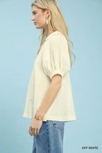 Off-white umgee textured trim short sleeve blouse with puffed sleeves and relaxed fit for casual wear