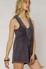 Umgee tie front sleeveless romper in navy blue with relaxed fit