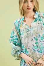 Umgee watercolor floral blouse in soft green and white lightweight fabric with puffed flounce sleeves