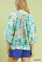 Umgee watercolor floral blouse in green mix with puffed sleeves and scalloped hem lightweight floral blouse
