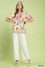 Umgee watercolor floral print blouse with loose flowing silhouette and ruffled sleeves in red mix colors