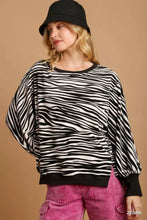 Umgee zebra striped fleece pullover oversized sweatshirt with black ribbed cuffs hem and neckline in black and white