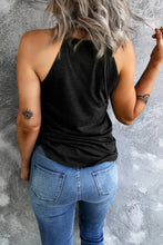 Black sleeveless usa Grecian neck cami with relaxed fit and subtle texture ideal for casual wear