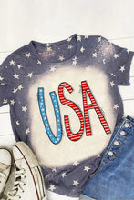 USA round neck short sleeve t-shirt in dark gray star pattern with bleached white center and red blue USA stripes