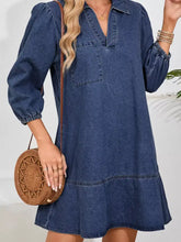 Blue denim long sleeve denim dress with v neck collar single chest pocket puff sleeves and frayed hem