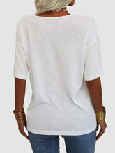 White V-neck dropped shoulder half sleeve T-shirt with relaxed fit